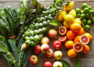 a group of fruits and vegetables on a wood surface Healthy Weight Loss Diets Walsall